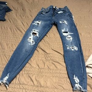 Kancan jeans skinny jeans with leapord patches inside distressed parts